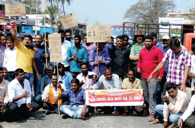 Protest against transfer of Bylakuppe SI