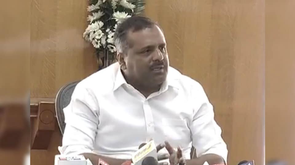 FIR against Minister Khader for luring voters with money