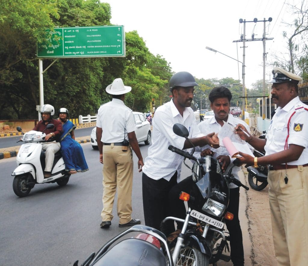 Bring in road discipline by booking traffic violators