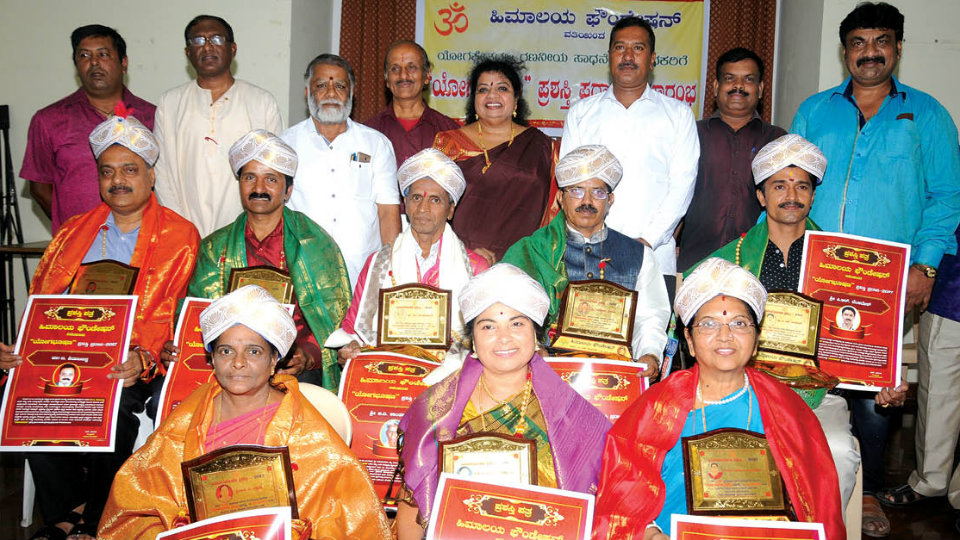 ‘Yogabhushana’ awards presented to achievers in city