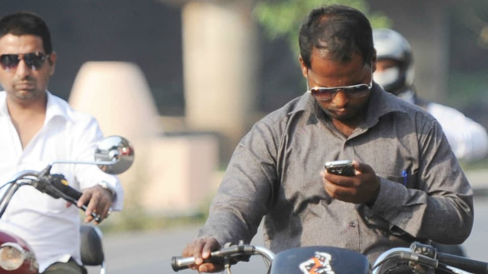 Mobile phone and motorists: Will this menace end?