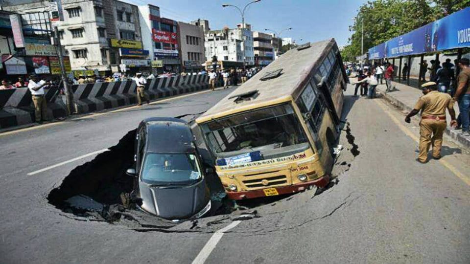 Chennai Road caves in, takes down bus, car