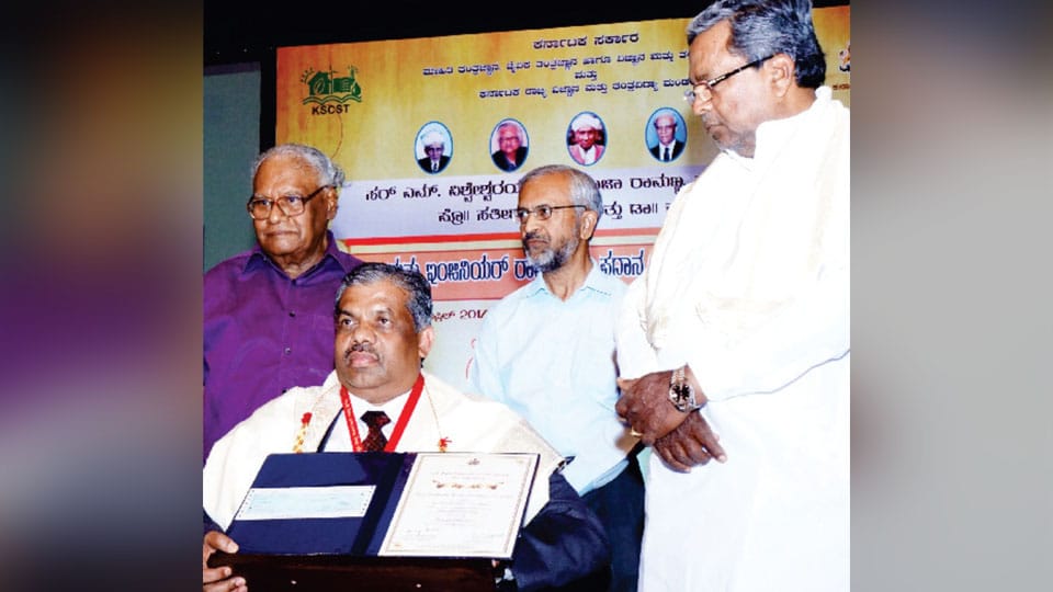Bags Dr. Raja Ramanna Award