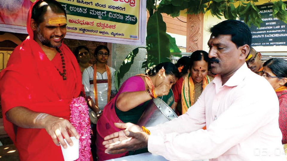 Free distribution of butter milk near Ganapathy Ashrama