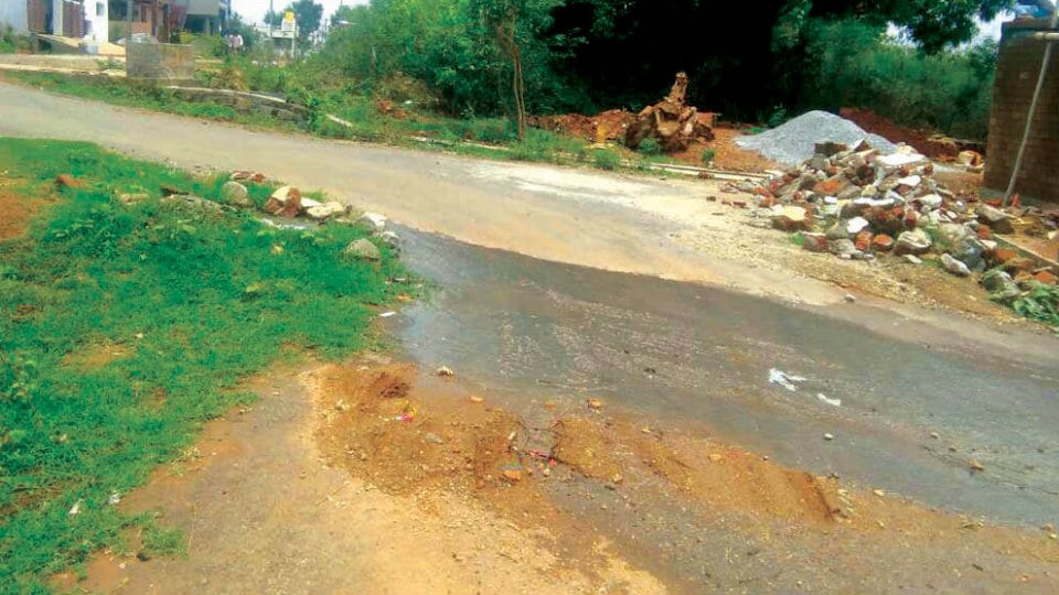 Overflowing manhole in Srirampura Revenue Layout