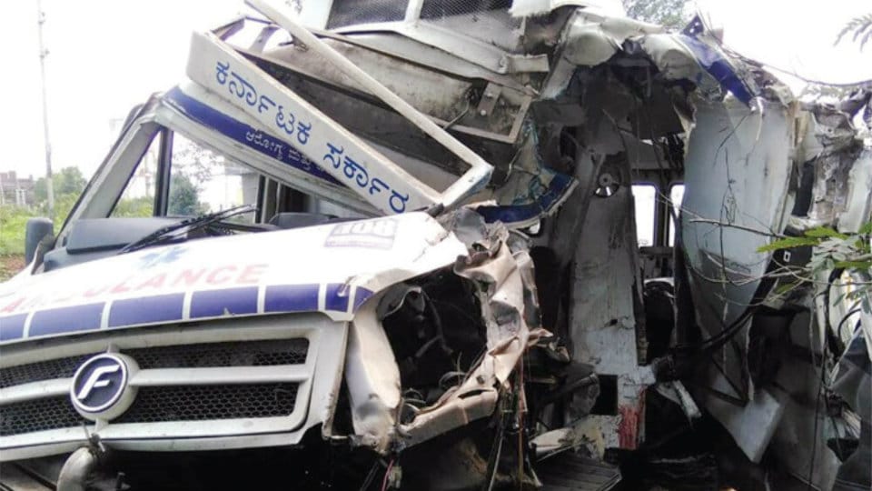 Ambulance driver killed as lorry hits vehicle