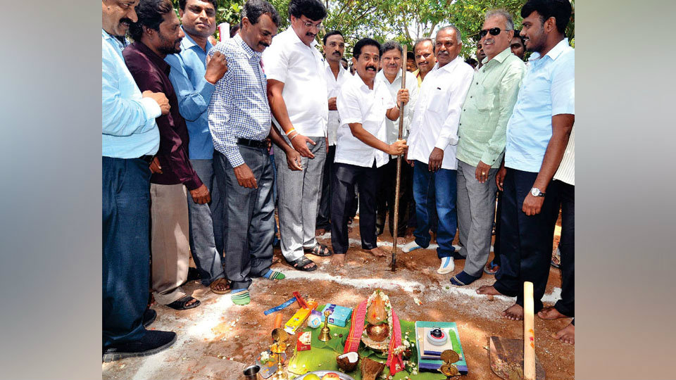 MLA performs guddali puja for construction of houses to poor