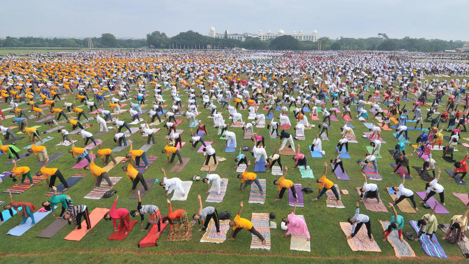 Over 25,000 rehearse for Guinness Yoga Record