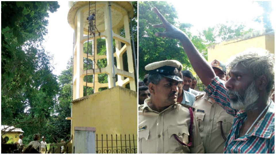 High drama as man threatens to jump from water tank