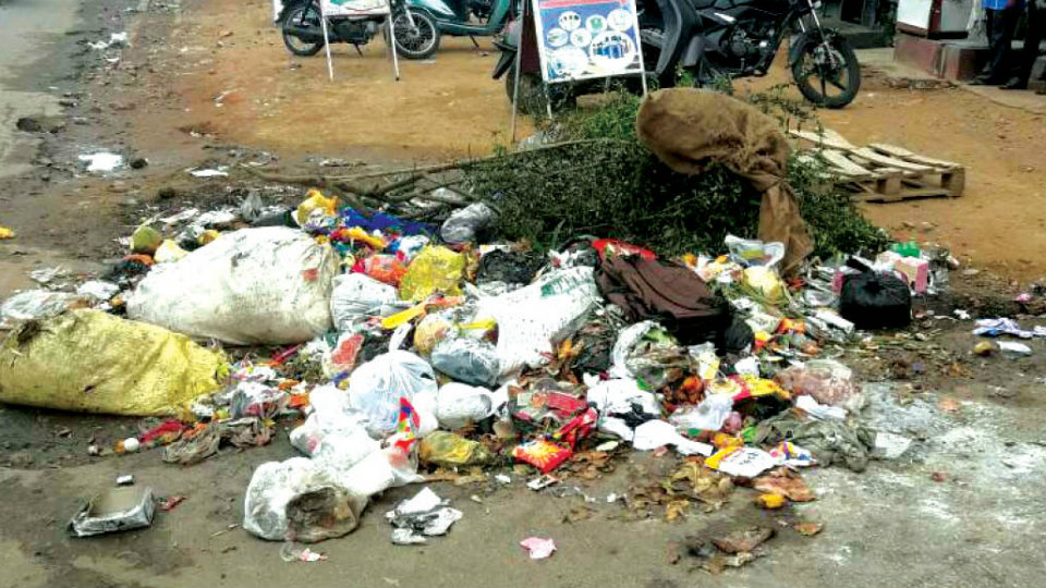 Plea to clear garbage pile at Shanthinagar