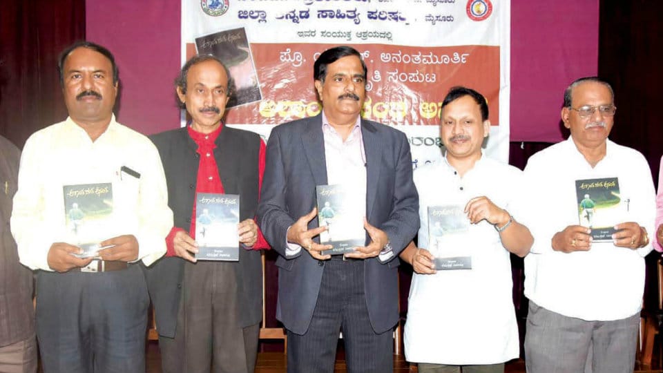 Dr. Manu Baligar releases Prof. URA’s book ‘Ashantha Santha Anantha’