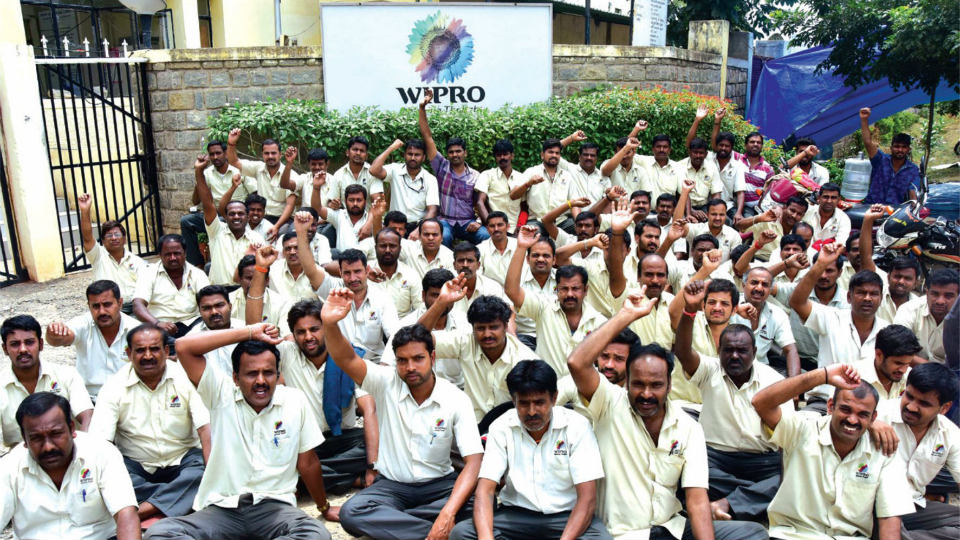 Wipro unit in city shuts down; Employees stage dharna