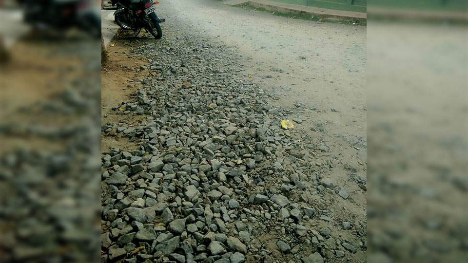 Asphalt this road in N.R. Mohalla