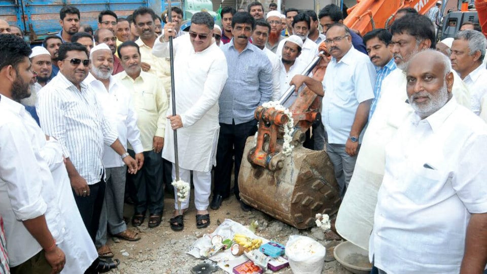 Minister performs guddali puja for drain works