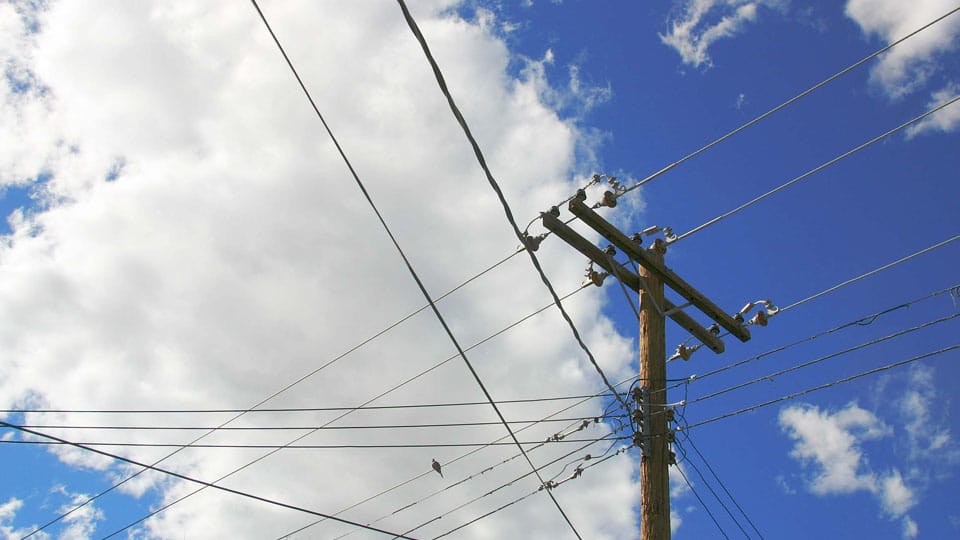 Will CESC fix spacers to overhead lines?