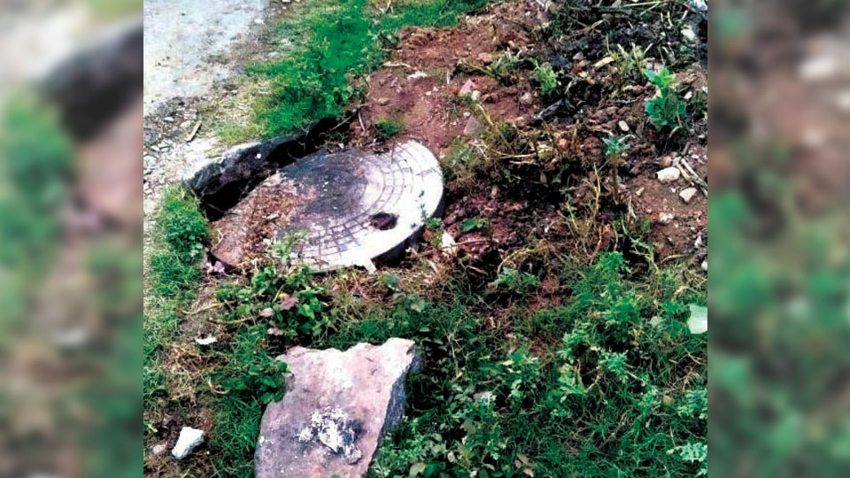 Damaged manhole cover posing danger in Chamarajapuram