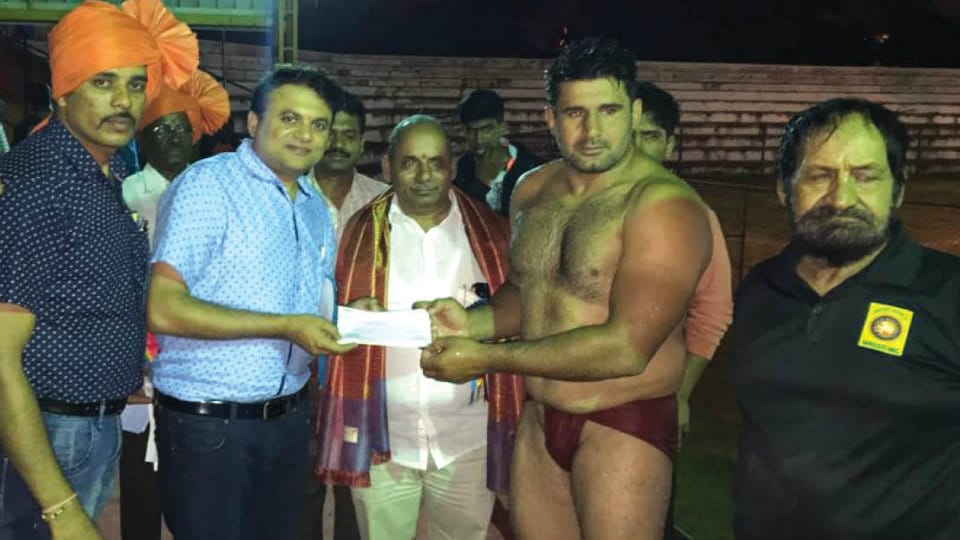 102nd birth anniversary of D. Devaraj Urs: District Administration hosts traditional wrestling tournament
