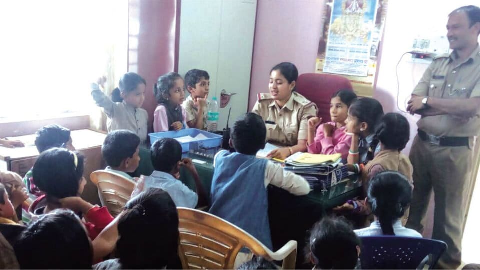 Children interact with Police personnel