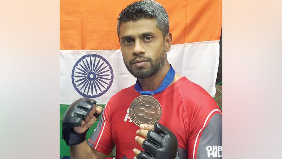 City’s Vikram wins bronze MMA championship