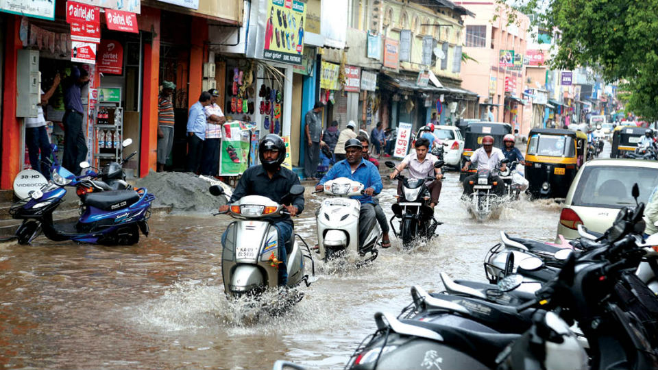 Roads turn to rivers as heavy rains lash city