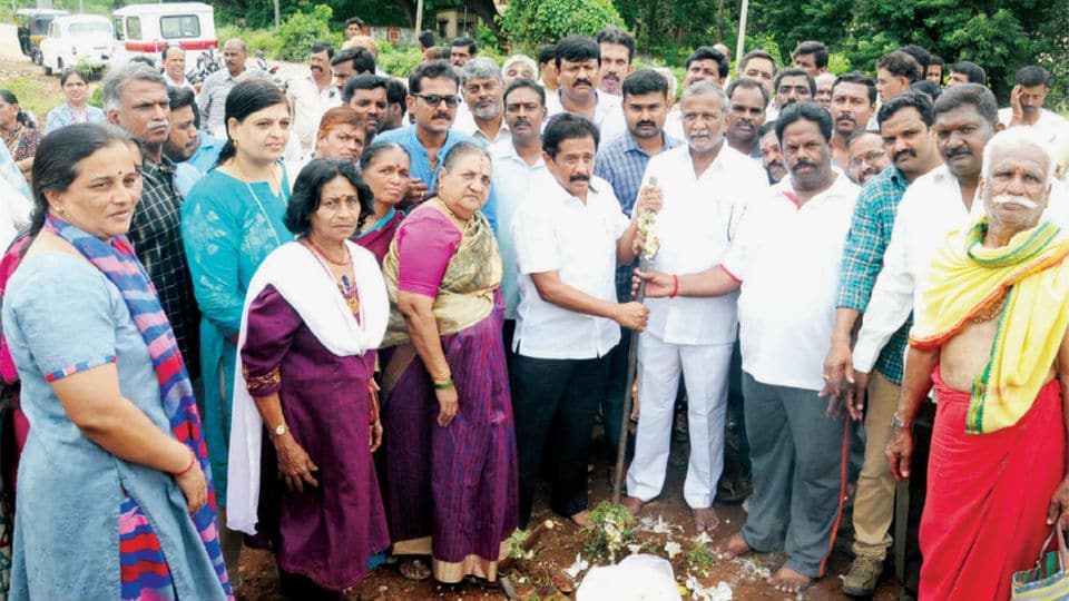 MLA performs guddali puja for drainage work at Srirampura
