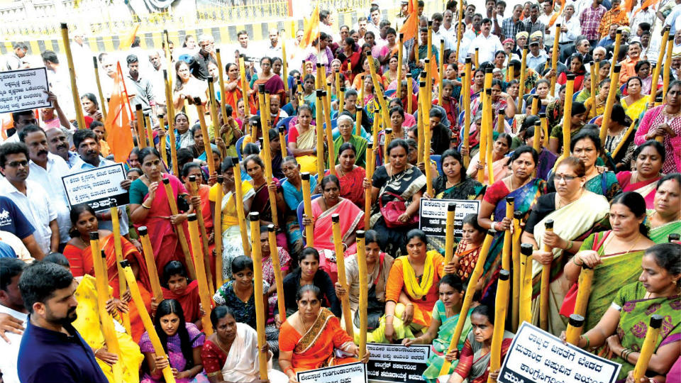 Women stage pestle demo against Tipu Jayanti