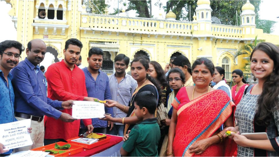 Belaku Samsthe distributes booklets on learning Kannada