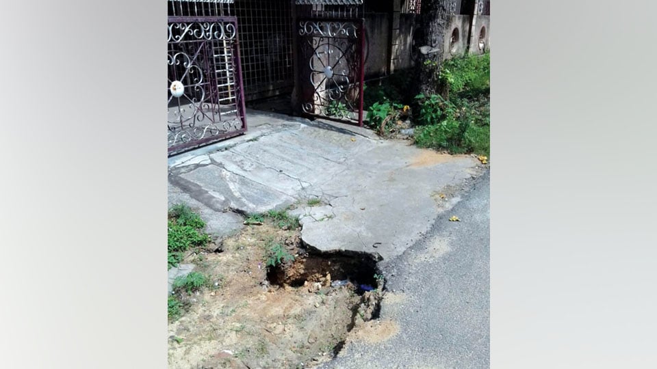 Part of road caves-in at N.R. Mohalla