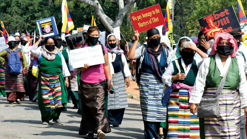 Tibetans take out Peace March in city