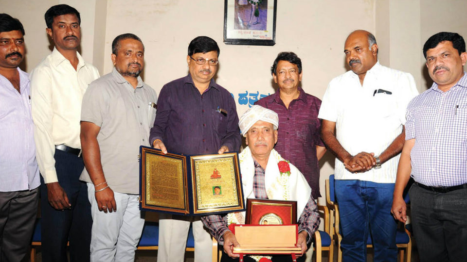 Sri Shivarathreeshwara Media Award presented to Journalist D. Mahadevappa