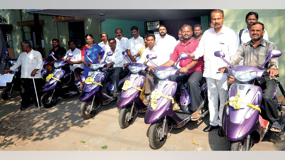 MP R. Dhruvanarayan  donates modified motorcycles to specially-abled