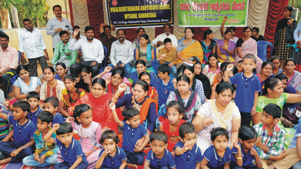 Specially-abled children and parents stage demonstration