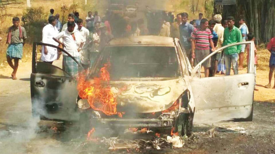 Threshing Crops on Road: Car catches fire after driving over millet straw strewn on road