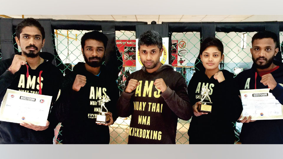 Wins medals at MMA Open Championships