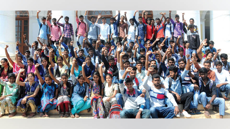 Yuvaraja’s College students protest for laptops