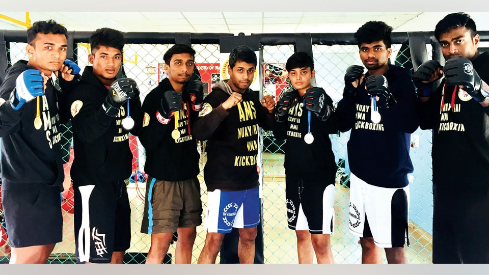 Bag medals at State MMA Championships