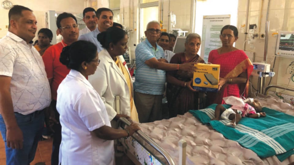 Helping Hands donate air beds to K.R. Hospital