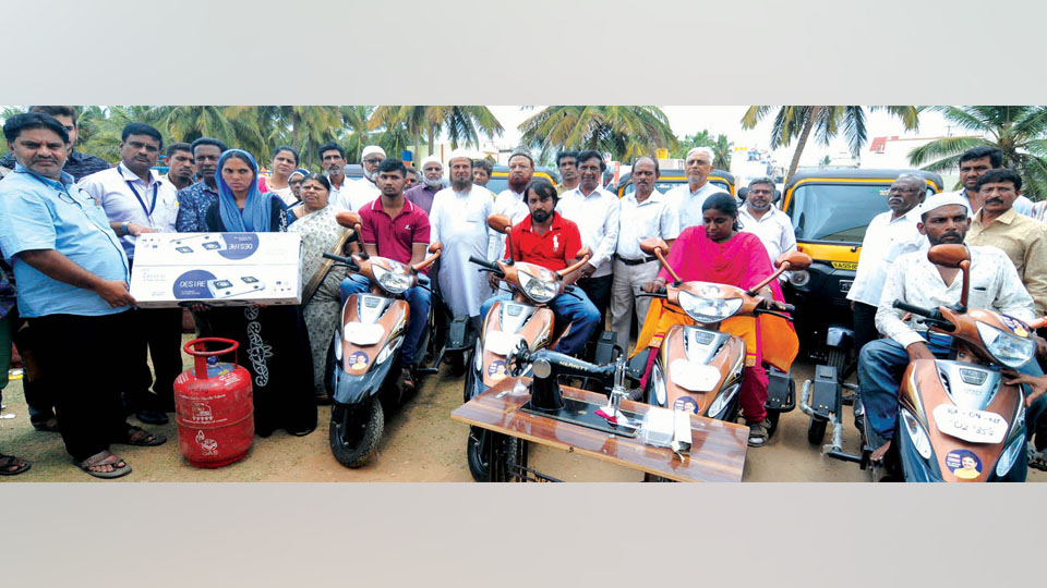 Ex-Mayor distributes three-wheelers, cooking gas, autos to beneficiaries