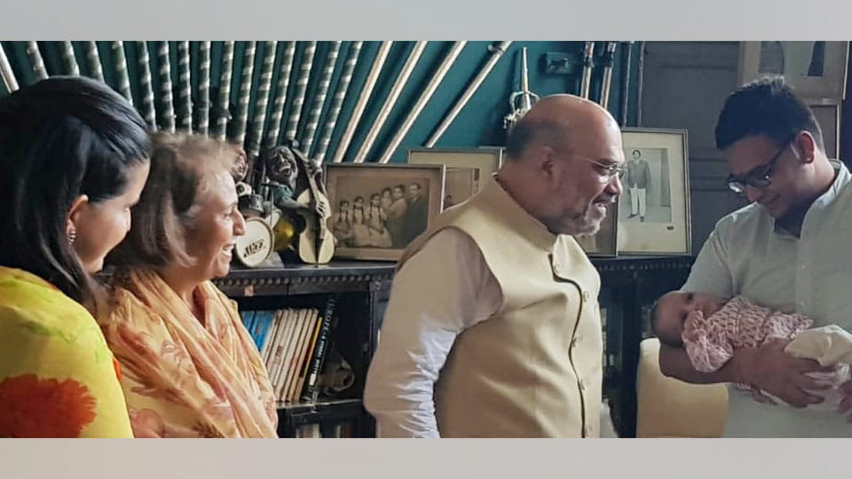BJP National President Amit Shah calls on Wadiyar family at Mysore Palace