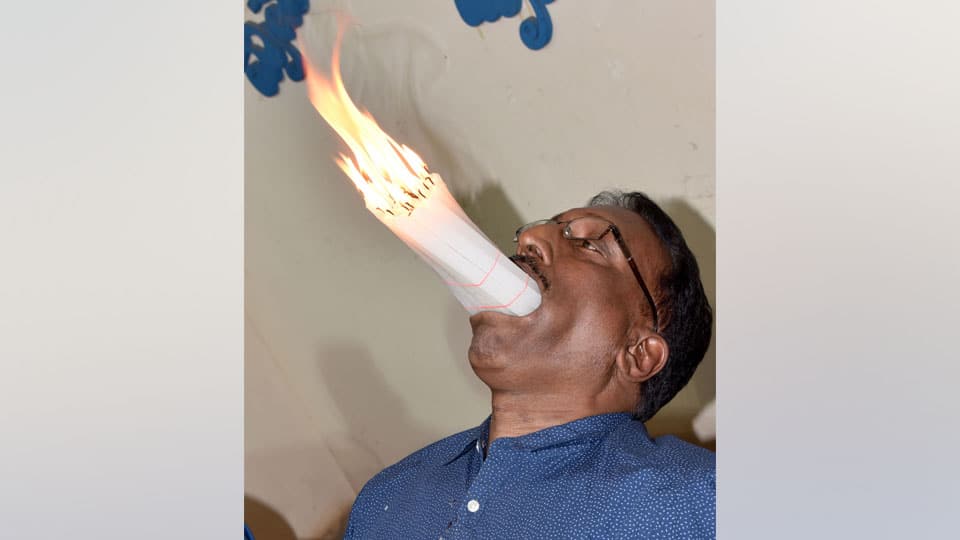 Man sets record by stuffing 20 burning candles in mouth