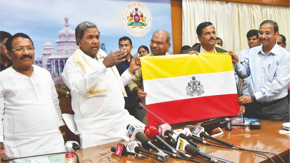 CM unveils Karnataka flag ahead of elections
