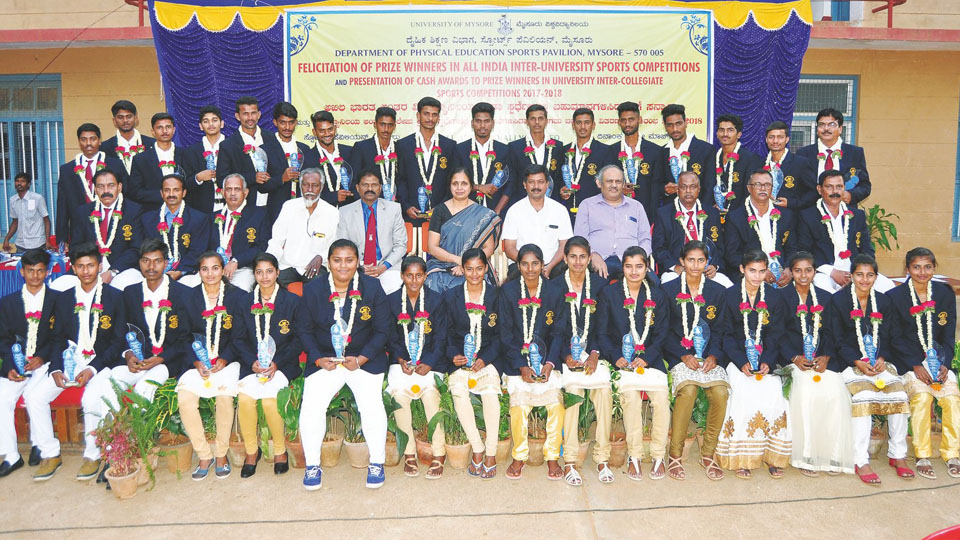 Mysore Varsity fetes sports persons