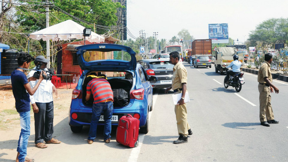 Checking ! Cops begin frisking for cash and liquor at 49 check-posts in Mysuru