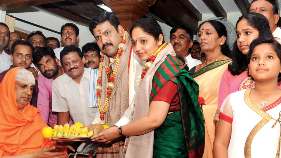 Varuna BJP likely candidate B.Y. Vijayendra visits Hill Temple