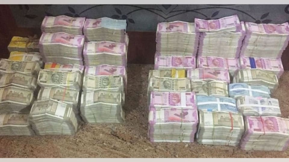 I-T sleuths seize Rs. 6.76 crore cash in multiple raids