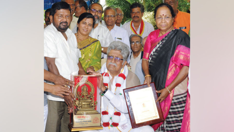 Hampi University confers Nadoja Award on Pt. Rajiv Taranath
