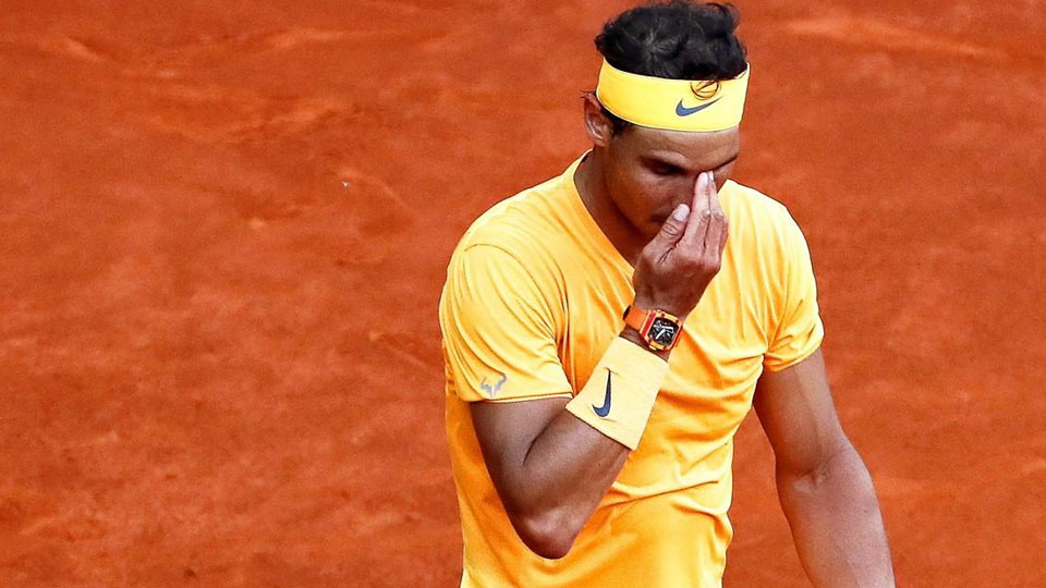 Rain halts play: Nadal in limbo