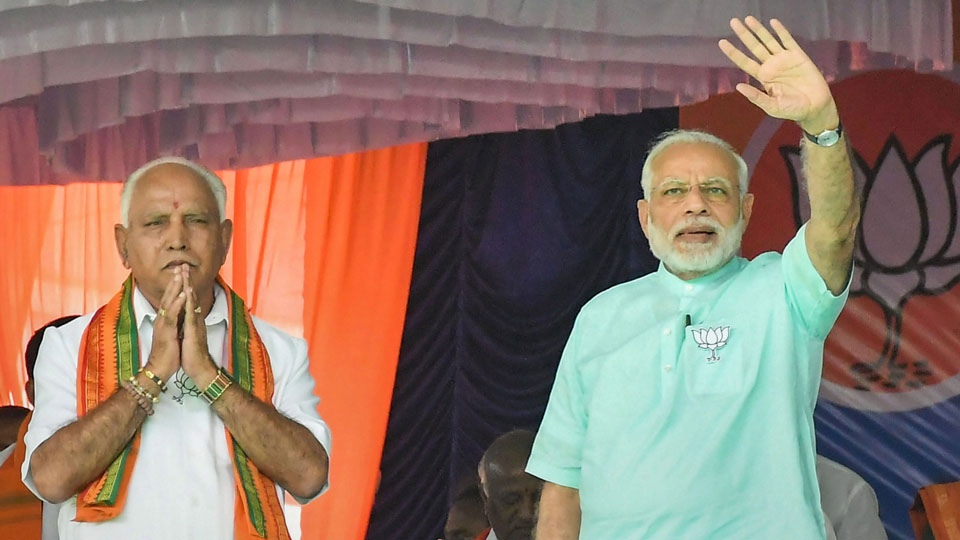BJP rides on Modi’s charisma, leads in five Exit Polls