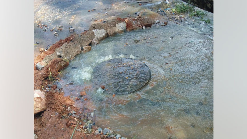 Sewage water overflowing from manhole in Hebbal