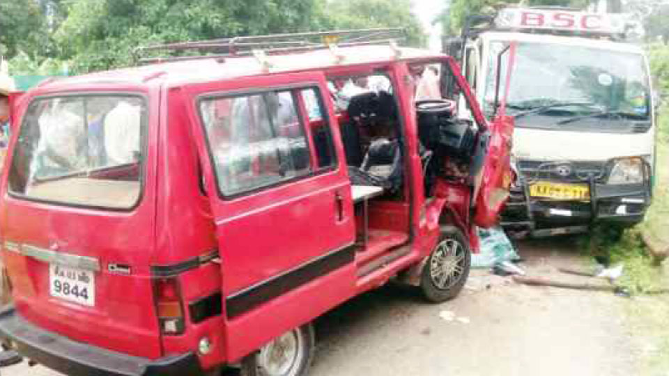 School Van driver killed as van collides with goods vehicle
